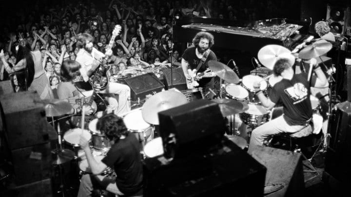 SAN FRANCISCO - MARCH 20:  The Grateful Dead  (L to R front: Donna Godchaux, Phil Lesh, Bob Weir, Jerry Garcia / l to r rear: Mickey Hart, Bill Kreutzmann, Keith Godchaux) perform at Winterland on March 20, 1977 in San Francisco, California.  (Photo by Ed Perlstein/Redferns/Getty Images)