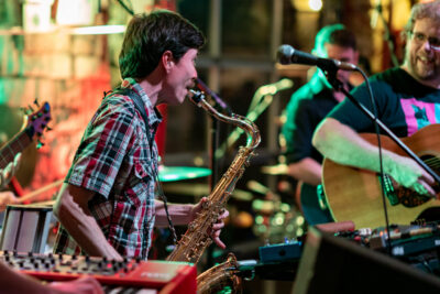 Christian Ryan with Row Jomah - Jon Strojny